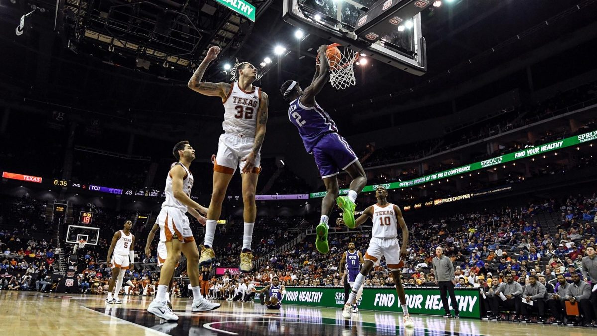 TCUs Emanuel Miller going up for a slam dunk against the No. 7 Texas Longhorns on March 11, 2023.
