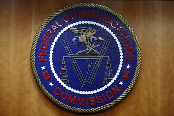 The seal of the Federal Communications Commission (FCC) is seen before an FCC meeting to vote on net neutrality in Washington, Thursday, Dec. 14, 2017.