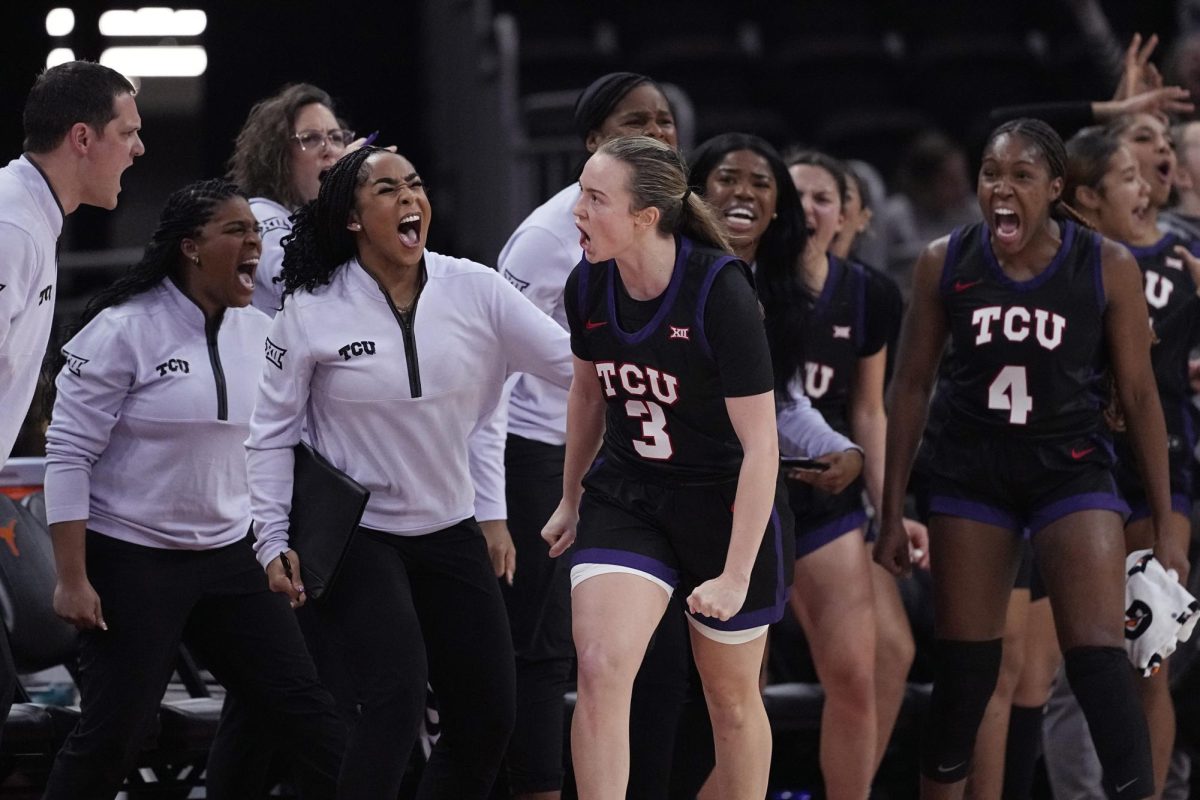 TCU guard Madison Conner (3) reacts after scoring against Texas during the second half of an NCAA college basketball game in Austin, Texas, Wednesday, Jan. 10, 2024. (Eric Gay)