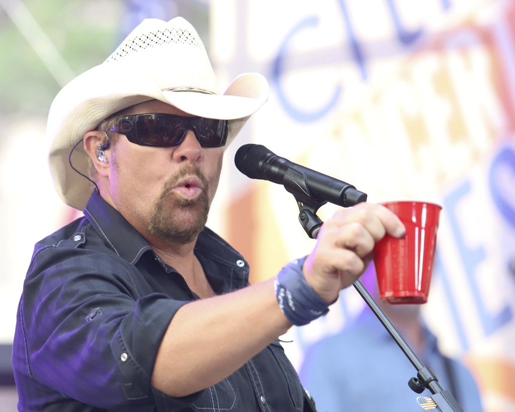 File+-+Country+music+recording+artist+Toby+Keith+holds+a+red+Solo+cup+as+he+performs+on+NBCs+Today+show+at+Rockefeller+Plaza+on+July+5%2C+2019%2C+in+New+York.+Keith%2C+who+died+Monday+at+62%2C+immortalized+the+humble+plastic+cups+in+his+2011+hit+Red+Solo+Cup.+%28Photo+by+Greg+Allen%2FInvision%2FAP%2C+File%29