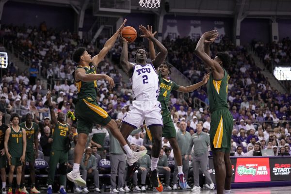 TCUs Emanuel Miller goes up for a layup against No. 15 Baylor on Senior Night. (Photo courtesy of gofrogs.com)