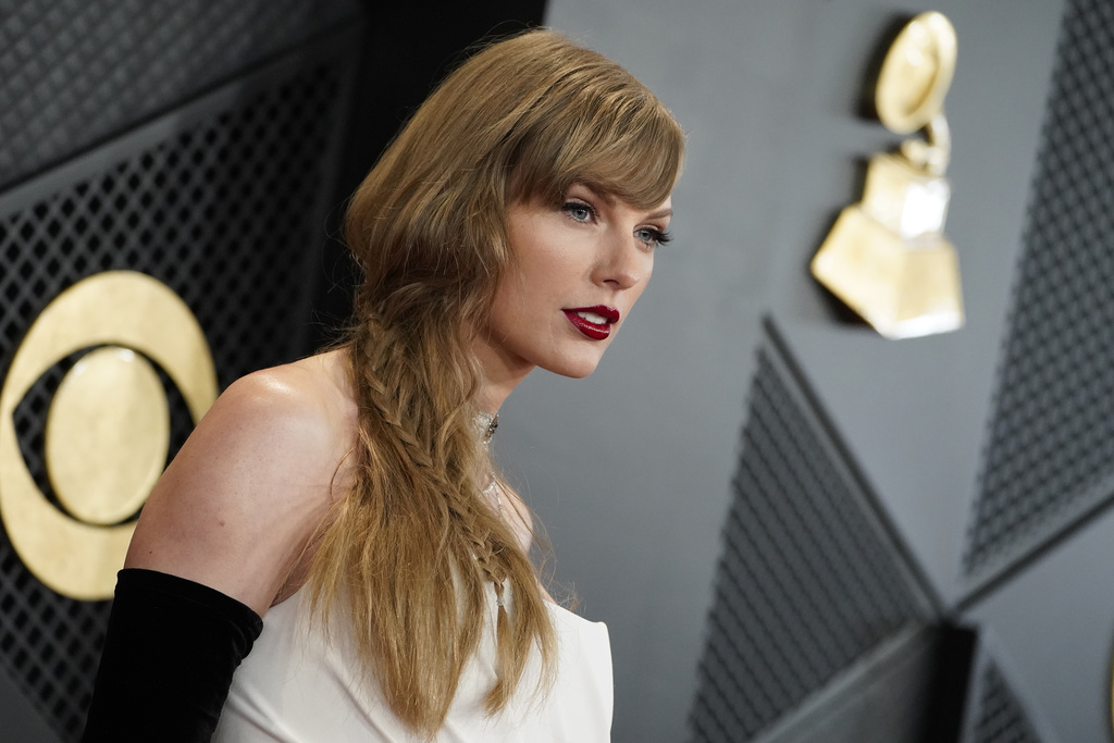 Taylor Swift arrives at the 66th annual Grammy Awards on Feb. 4, 2024, in Los Angeles. (AP Photos/Jordan Strauss) 