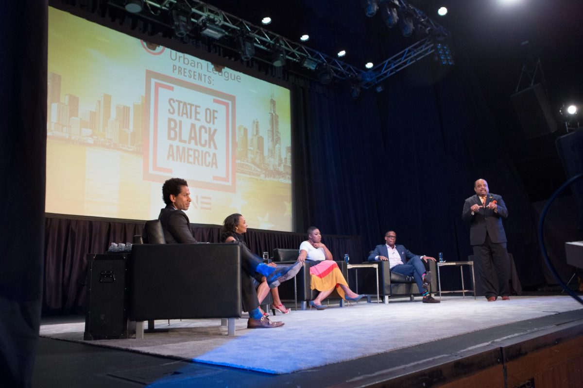 Jeff Johnson at the State of Black America town hall along with journalist Touré and Angela Sailor, as well as former National Press Secretary Symone Sanders. (AP Photo)