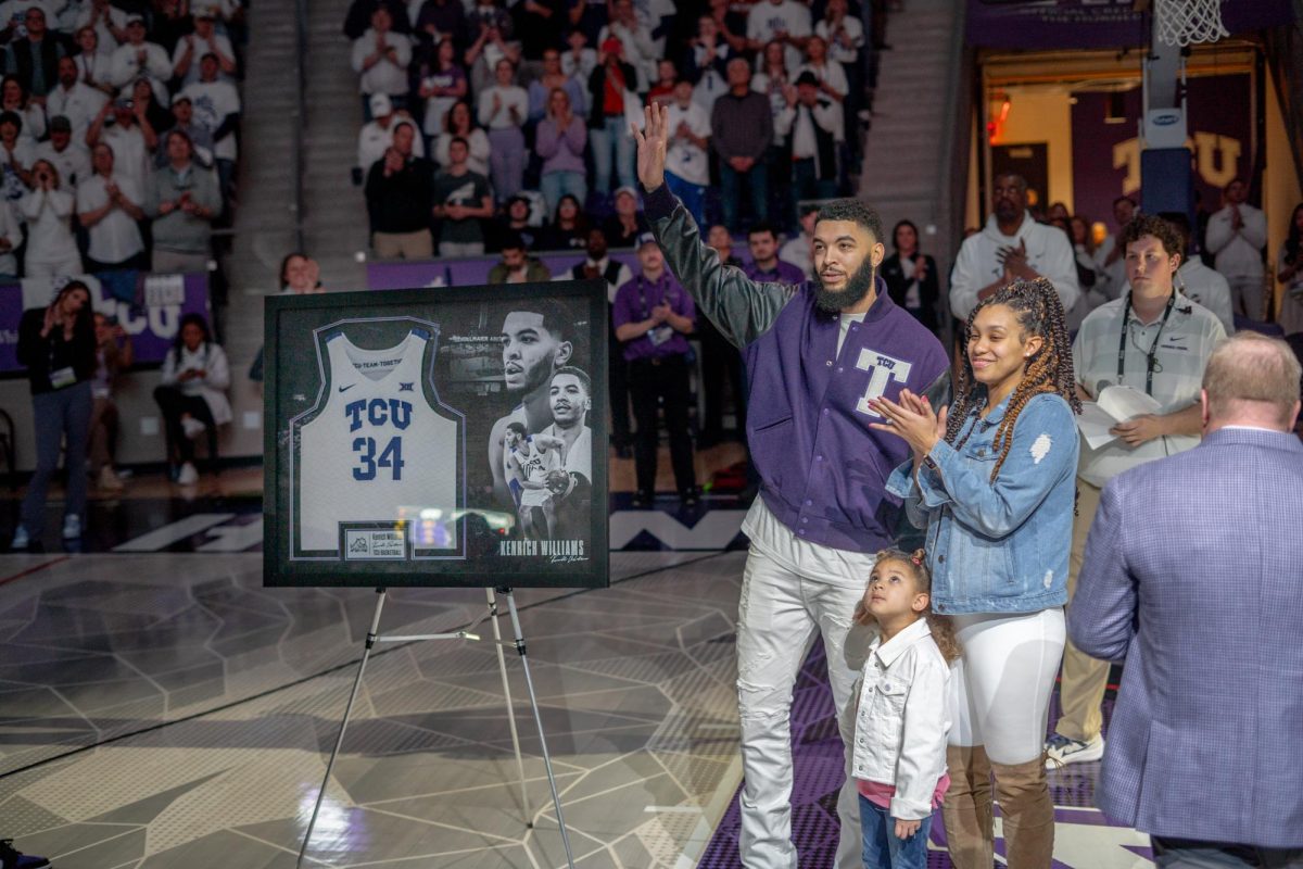 Kenrich Williams has his jersey retired during a halftime ceremony at Ed and Rae Schollmaier Arena, Feb. 3, 2024. Williams is the fifth Horned Frog to have his jersey retired for mens basketball. (TCU 360/ Shane Manson)