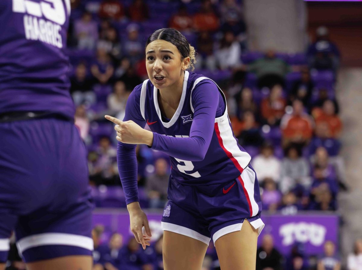 TCU guard Tara Manumaleuga talks to her teammate at Ed and Rae Schollmaier Arena in Fort Worth, Texas on February 10th, 2024. The TCU Horned Frogs fell to the Texas Longhorns 65-43. (TCU360/Tyler Chan) 