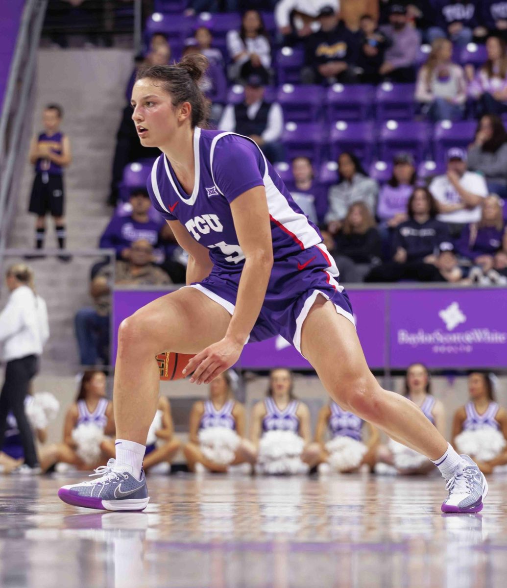 TCU guard Una Jovanovic dribbles the ball at Ed and Rae Schollmaier Arena in Fort Worth, Texas on February 10th, 2024. The TCU Horned Frogs fell to the Texas Longhorns 65-43. (TCU360/Tyler Chan) 