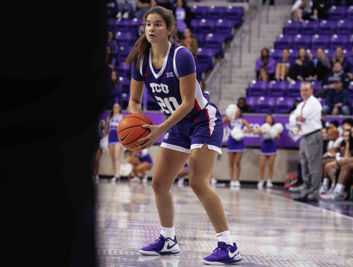 TCU guard Ella Hamlin looks to pass the ball at Ed and Rae Schollmaier Arena in Fort Worth, Texas on February 10th, 2024. The TCU Horned Frogs fell to the Texas Longhorns 65-43. (TCU360/Tyler Chan) 