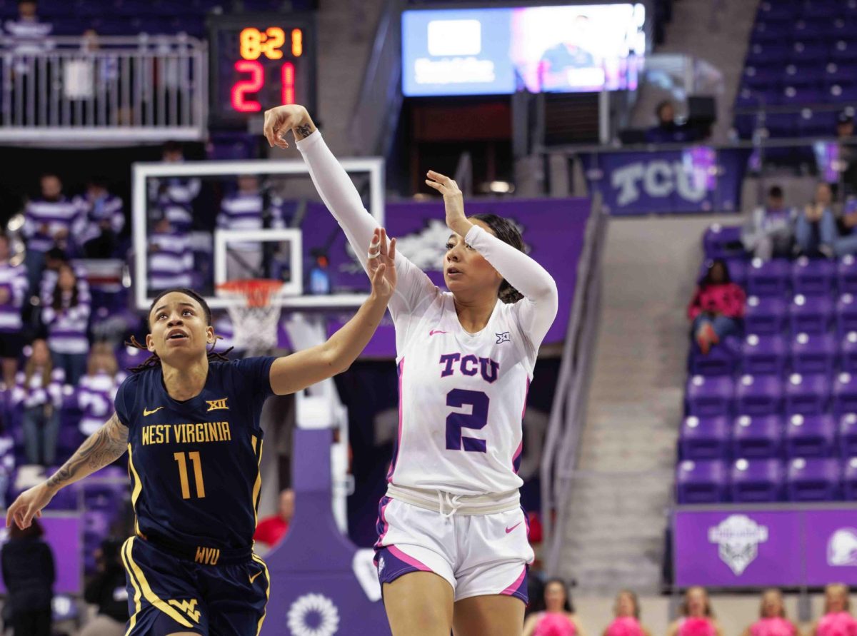 TCU guard Tara Manumaleuga watches her shot at Ed and Rae Schollmaier Arena in Fort Worth, Texas on February 13th, 2024. The TCU Horned Frogs fell to the West Virginia Mountaineers 77-52. (TCU360/ Tyler Chan)