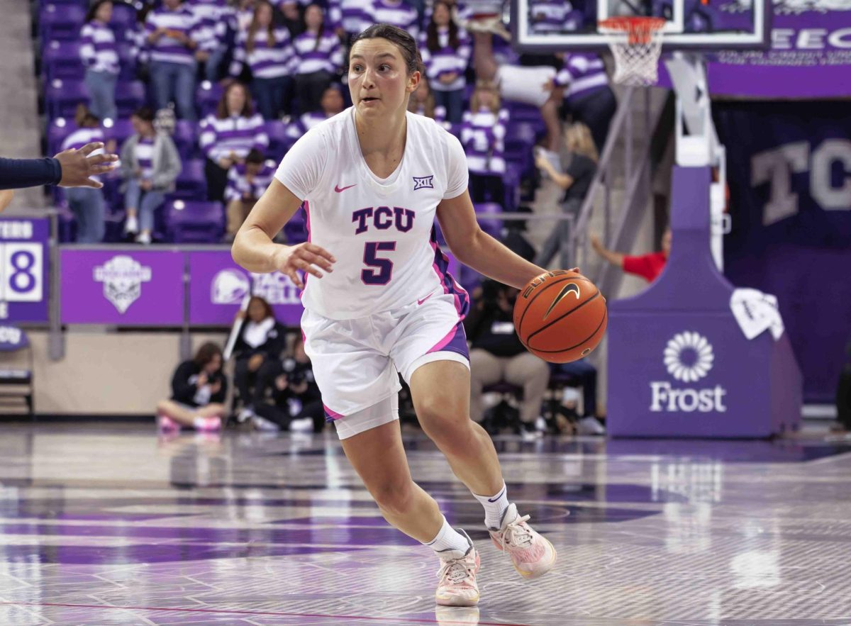 TCU guard Una Jovanovic drives towards the basket at Ed and Rae Schollmaier Arena in Fort Worth, Texas on February 13th, 2024. The TCU Horned Frogs fell to the West Virginia Mountaineers 77-52. (TCU360/ Tyler Chan)