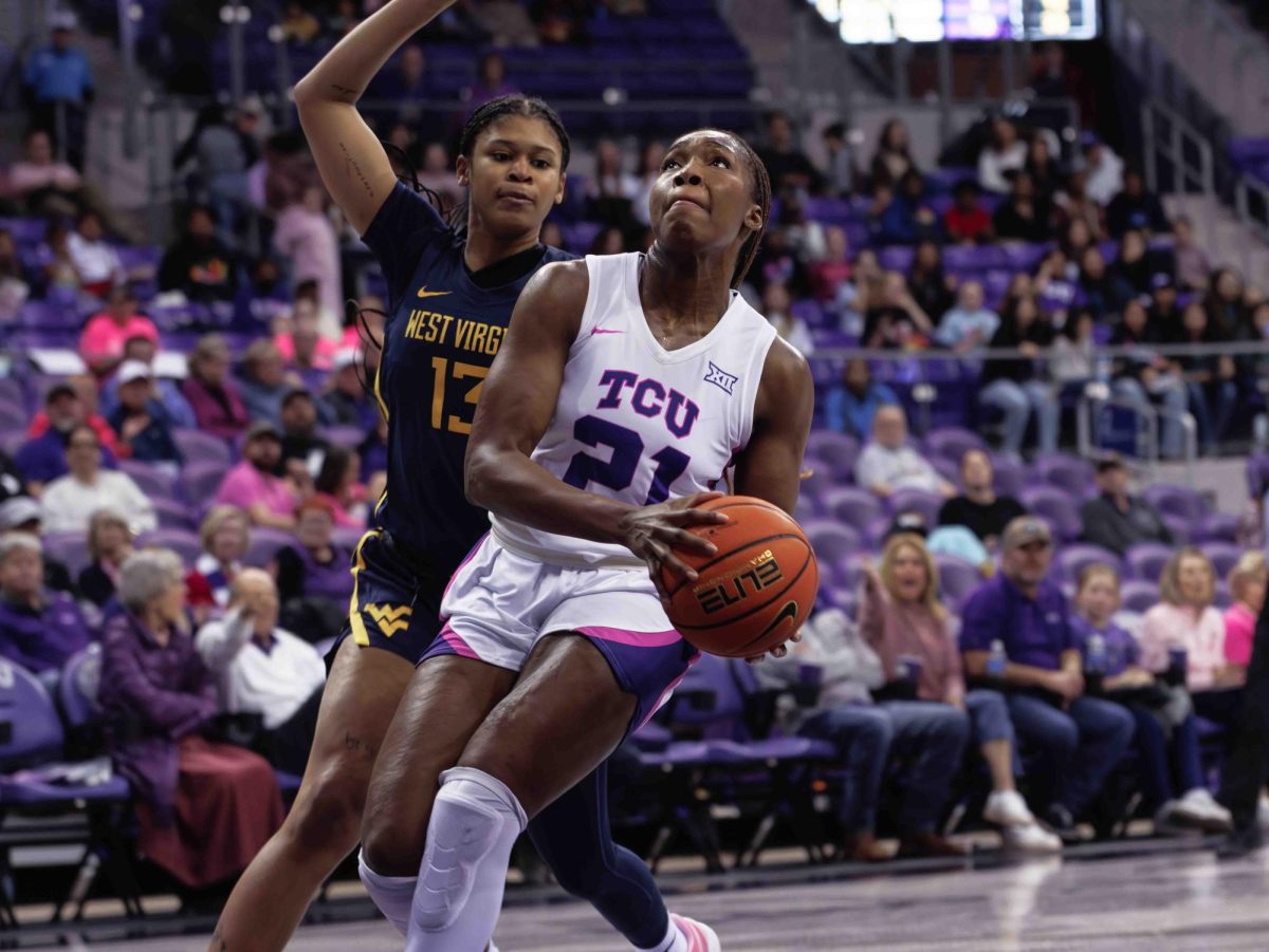 TCU forward Agnes Emma-Nnopu goes up for a layup at Ed and Rae Schollmaier Arena in Fort Worth, Texas on February 13th, 2024. The TCU Horned Frogs fell to the West Virginia Mountaineers 77-52. (TCU360/ Tyler Chan)