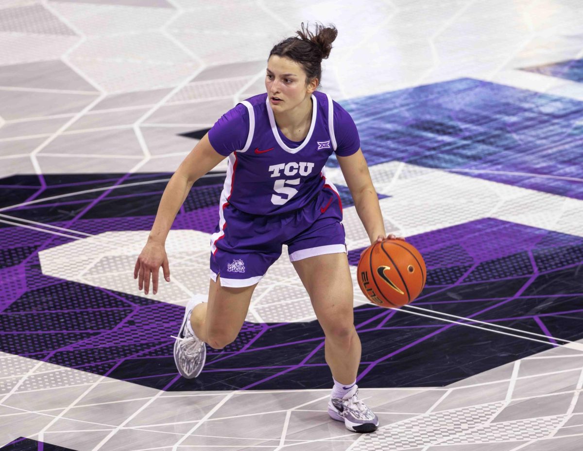 TCU guard Una Jovanovic dribbles the ball at Ed and Rae Schollmaier Arena in Fort Worth, Texas on February 28th, 2024. The TCU Horned Frogs beat the Texas Tech Lady Raiders 73-52. (TCU360/ Tyler Chan)