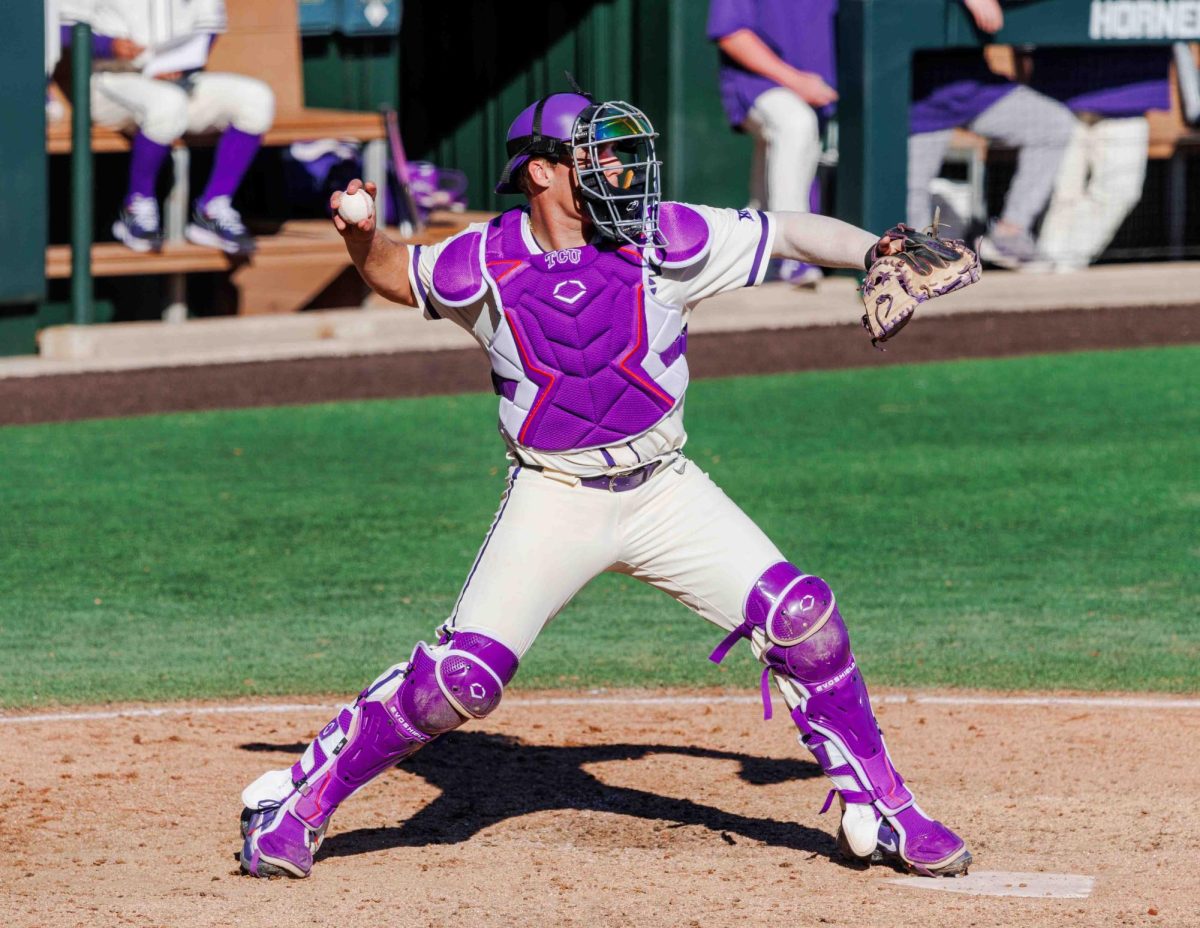 TCU catcher Kurtis Byrne throws the ball at Lupton Stadium in Fort Worth, Texas on February 18th, 2024. The TCU Horned Frogs beat the Florida Gulf Coast Eagles 11-6. (TCU360/ Tyler Chan)