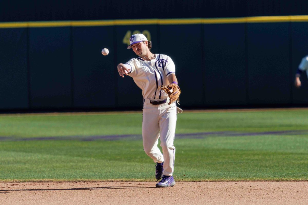 TCU second basemen Peyton Chatagnier throws the ball at Lupton Stadium in Fort Worth, Texas on February 18th, 2024. The TCU Horned Frogs beat the Florida Gulf Coast Eagles 11-6. (TCU360/ Tyler Chan)
