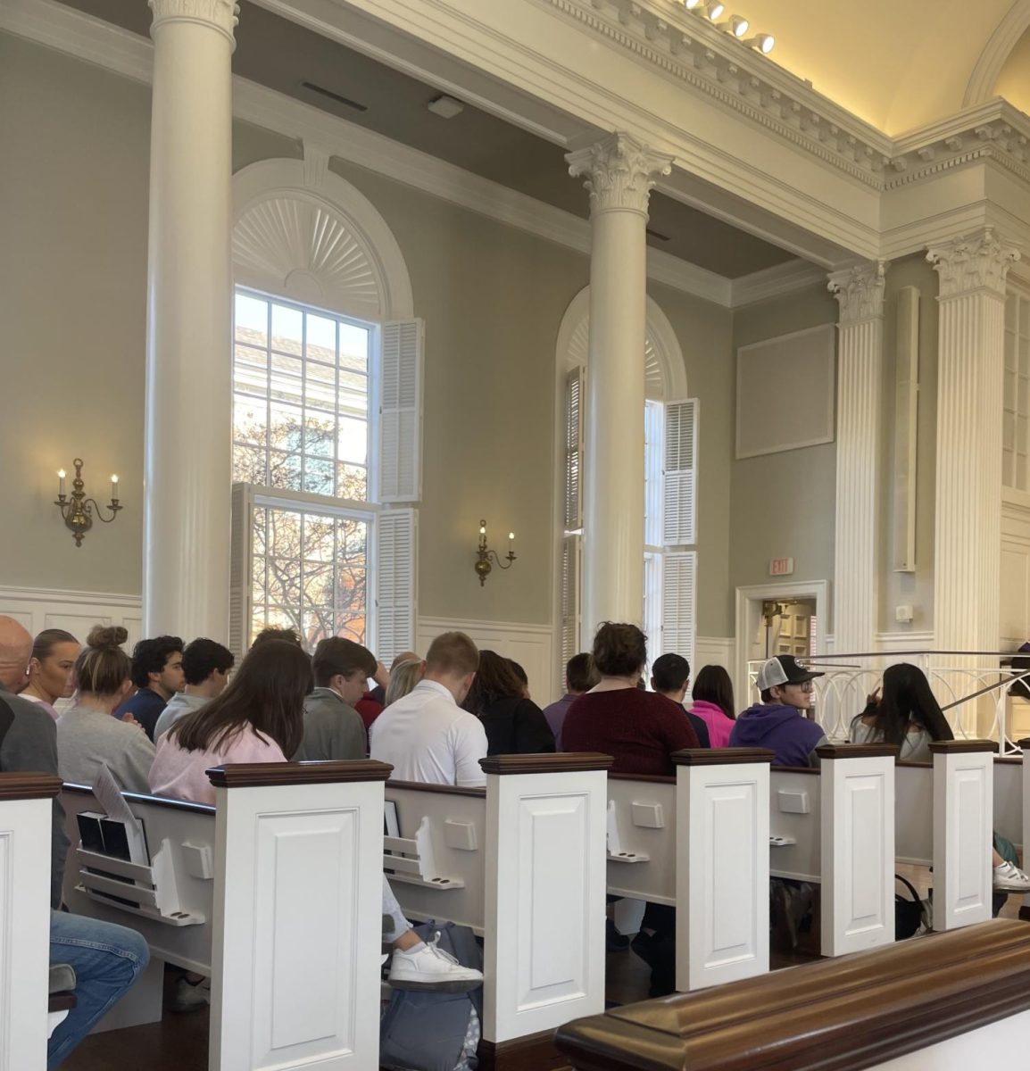 People sit in the pews of Robert Carr Chapel on Wednesday, Feb. 14 for Ash Wednesday service. (Aliyah Howell/Staff Photographer)