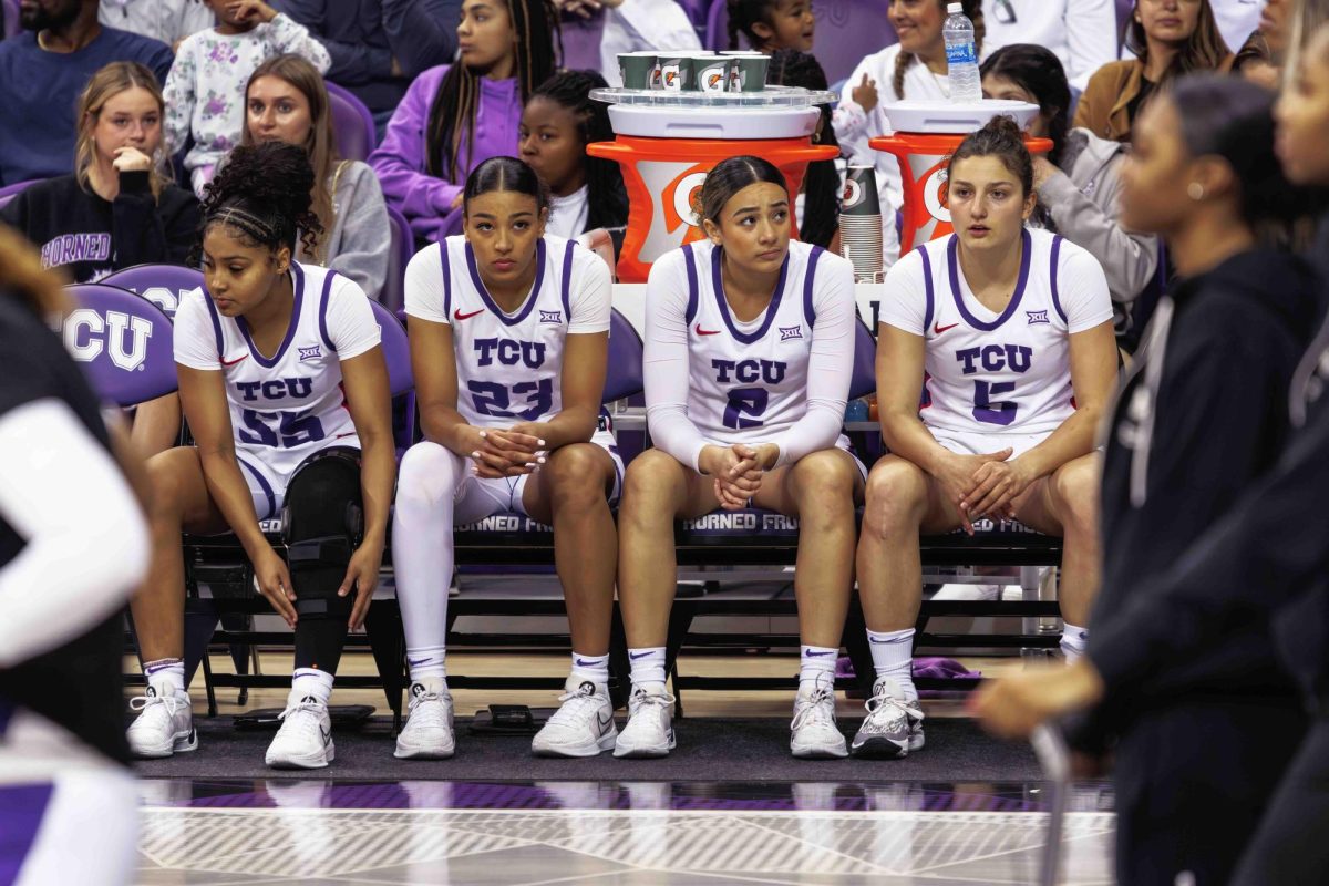 TCU players look on before the game at Ed and Rae Schollmaier Arena in Fort Worth, Texas on February 3, 2024. The TCU Horned Frogs fell to the Kansas Jayhawks 74-81. (TCU360/ Tyler Chan)