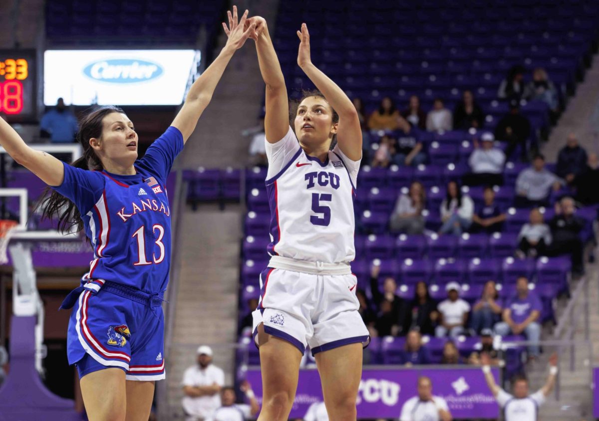 TCU guard Una Jovanovic shoots a three at Ed and Rae Schollmaier Arena in Fort Worth, Texas on February 3, 2024. The TCU Horned Frogs fell to the Kansas Jayhawks 74-81. (TCU360/Tyler Chan)
