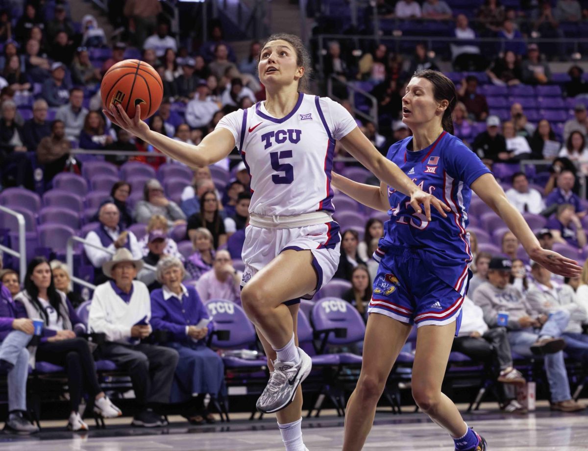 TCU guard Una Jovanovic goes up for a layup at Ed and Rae Schollmaier Arena in Fort Worth, Texas on February 3, 2024. The TCU Horned Frogs fell to the Kansas Jayhawks 74-81. (TCU360/ Tyler Chan)
