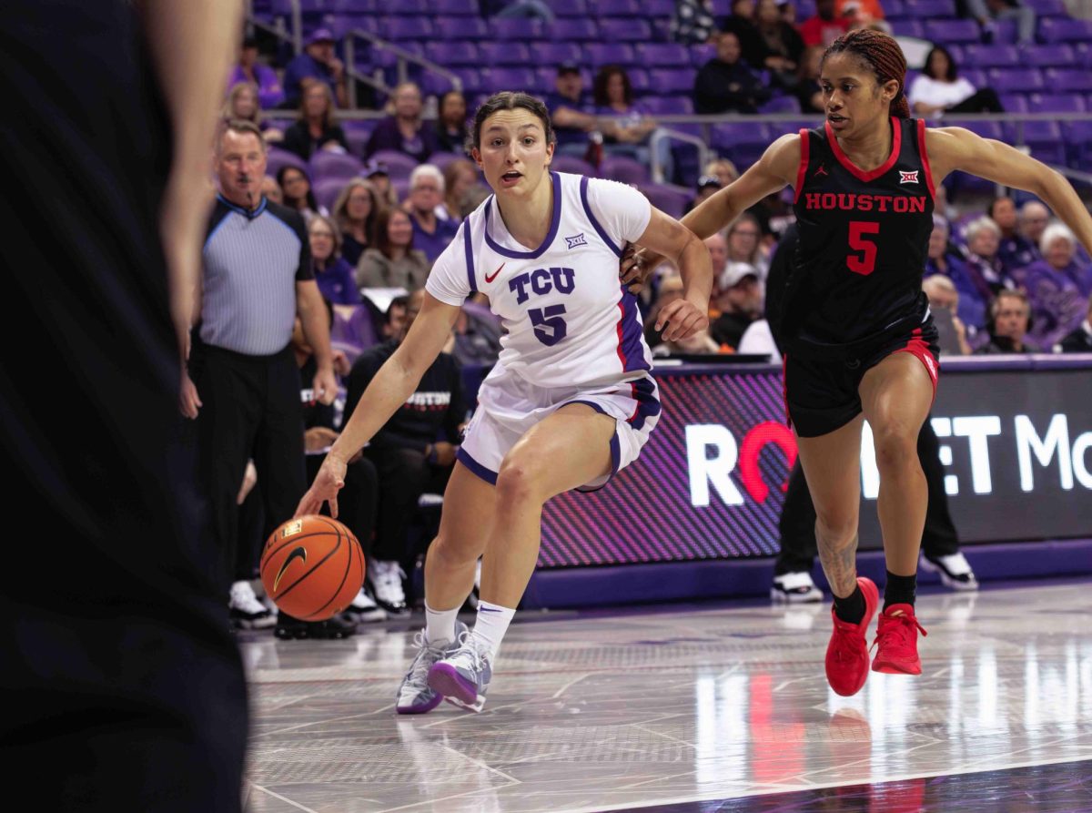 TCU guard Una Jovanovic drives towards the basket at Ed and Rae Schollmaier Arena in Fort Worth, Texas on February 24th, 2024. The TCU Horned Frogs beat the Houston Cougars 59-49. (TCU360/ Tyler Chan)