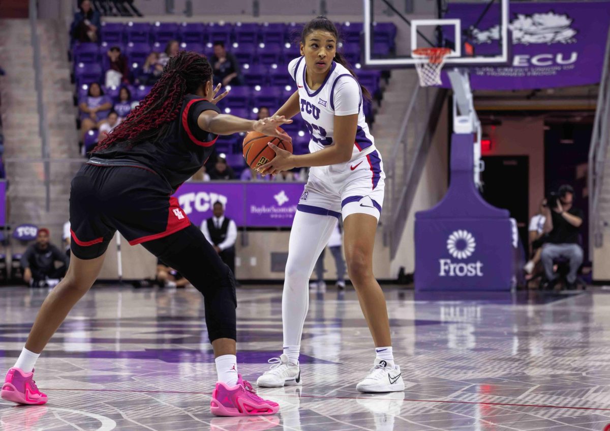 TCU forward Aaliyah Roberson looks to pass the ball at Ed and Rae Schollmaier Arena in Fort Worth, Texas on February 24th, 2024. The TCU Horned Frogs beat the Houston Cougars 59-49. (TCU360/ Tyler Chan)