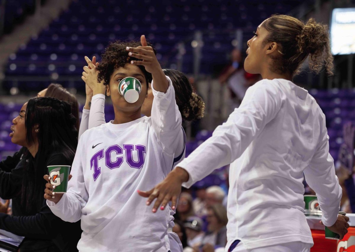 TCU guard Victoria Flores celebrates her teammate making a shot at Ed and Rae Schollmaier Arena in Fort Worth, Texas on February 24th, 2024. The TCU Horned Frogs beat the Houston Cougars 59-49. (TCU360/ Tyler Chan)