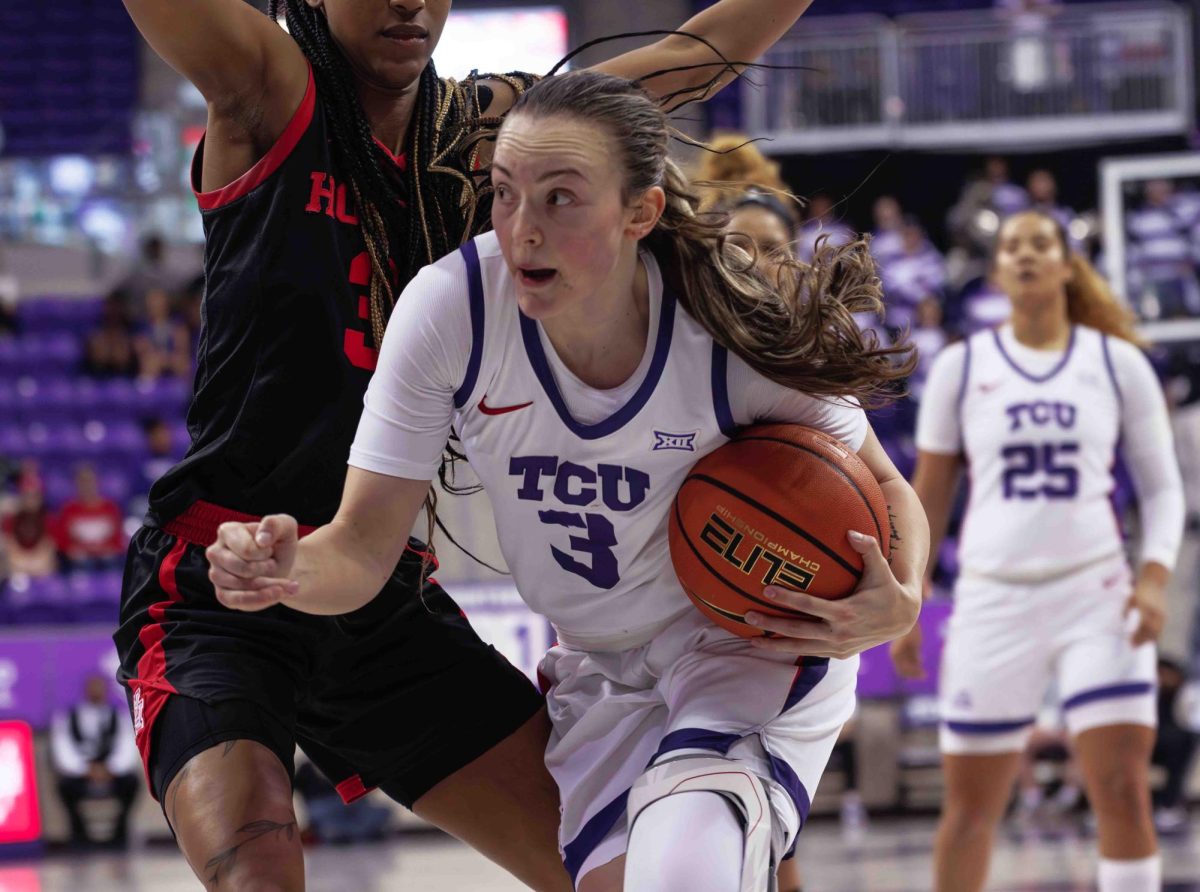 TCU guard Madison Conner drives towards the basket at Ed and Rae Schollmaier Arena in Fort Worth, Texas on February 24th, 2024. The TCU Horned Frogs beat the Houston Cougars 59-49. (TCU360/ Tyler Chan)