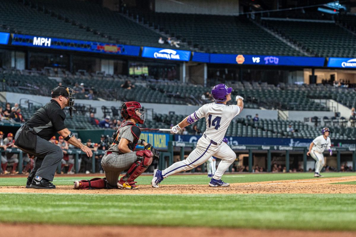 Karson Bowen hits a double against the USC Trojans on March 1, 2024 at Globe Life Field in Arlington, Tx.