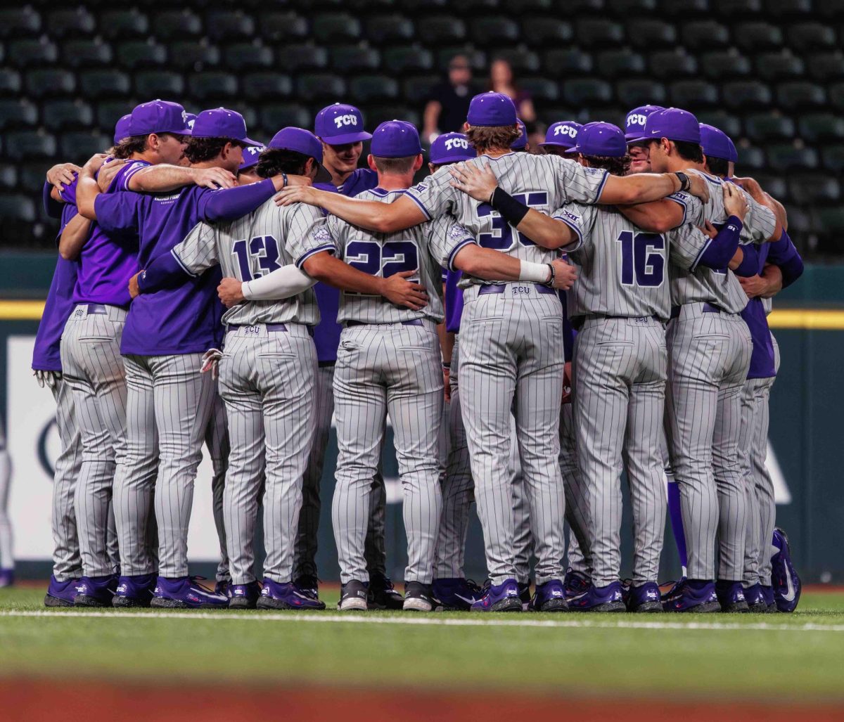 The TCU baseball team huddles up before the game at Globe Life Field in Arlington, Texas on March 2nd, 2024. The TCU Horned Frogs beat the Arizona State Sun Devils 11-9. (TCU360/ Tyler Chan)