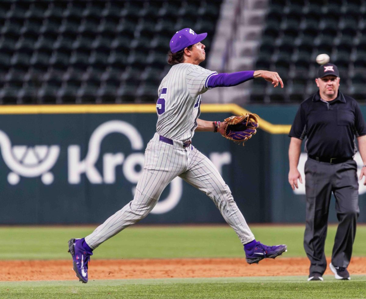 TCU shortstop Anthony Silva throws the ball across the field at Globe Life Field in Arlington, Texas on March 2nd, 2024. The TCU Horned Frogs beat the Arizona State Sun Devils 11-9. (TCU360/ Tyler Chan)