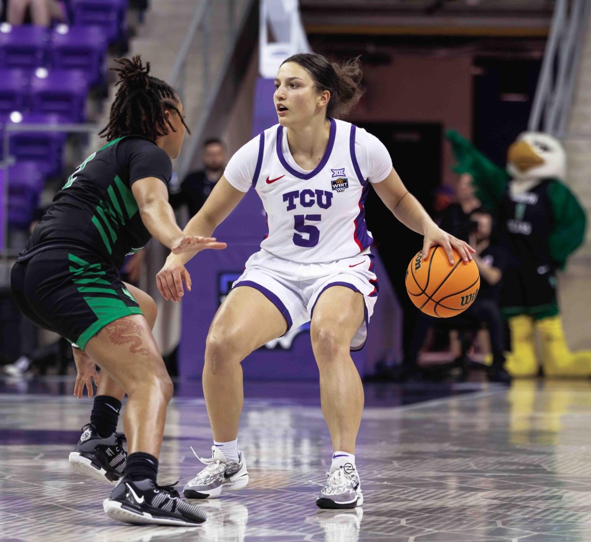 TCU guard Una Jovanovic dribbles the ball up the court at Ed and Rae Schollmaier Arena in Fort Worth, Texas on March 21st, 2024. The TCU Horned Frogs beat the North Texas Mean Green 67-58. (TCU360/ Tyler Chan)