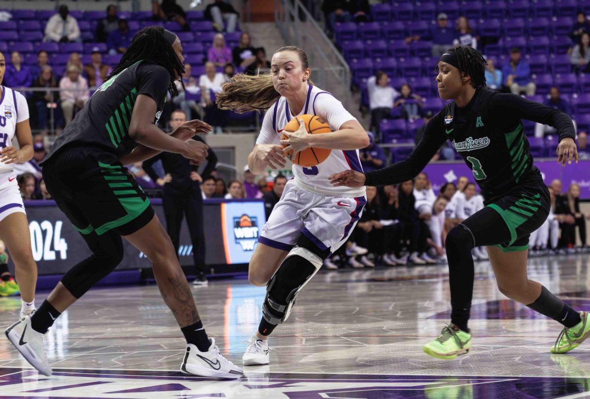 TCU guard Madison Conner drives towards the basket at Ed and Rae Schollmaier Arena in Fort Worth, Texas on March 21st, 2024. The TCU Horned Frogs beat the North Texas Mean Green 67-58. (TCU360/ Tyler Chan)