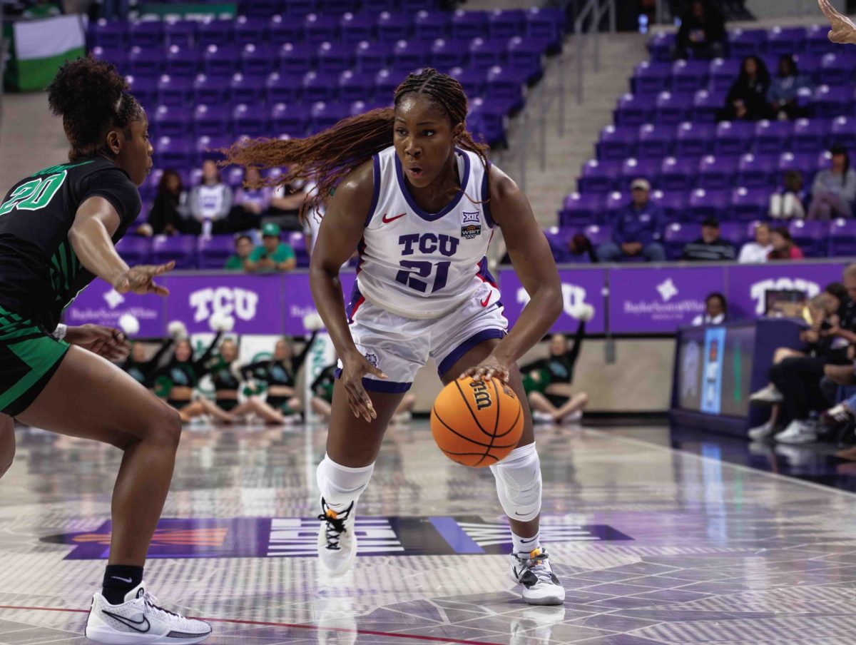 TCU forward Agnes Emma-Nnopu drives towards the basket at Ed and Rae Schollmaier Arena in Fort Worth, Texas on March 21st, 2024. The TCU Horned Frogs beat the North Texas Mean Green 67-58. (TCU360/ Tyler Chan)