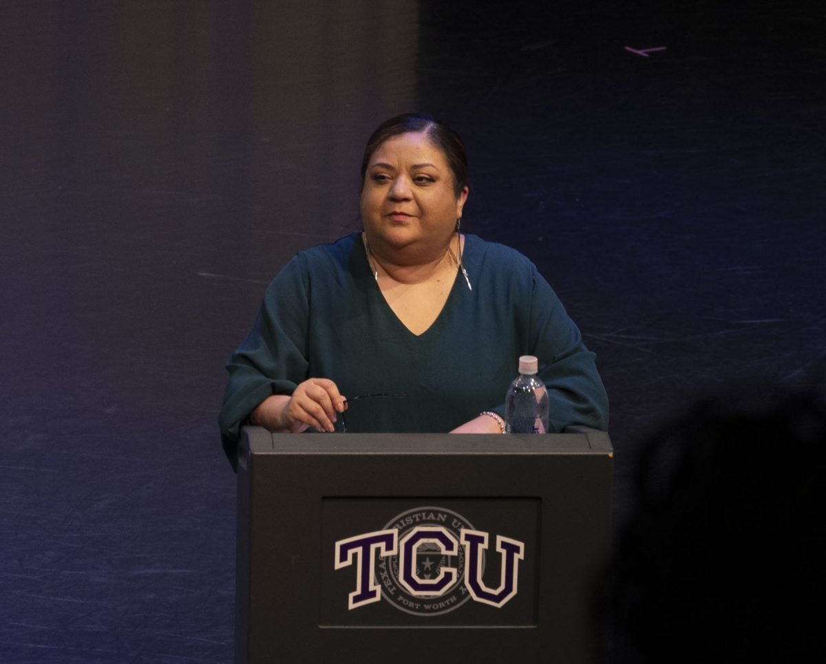 Michelle Manzanales captivates the audience delivering an engaging discussion.  (Miroslava Lem Quinonez/Staff Photographer)