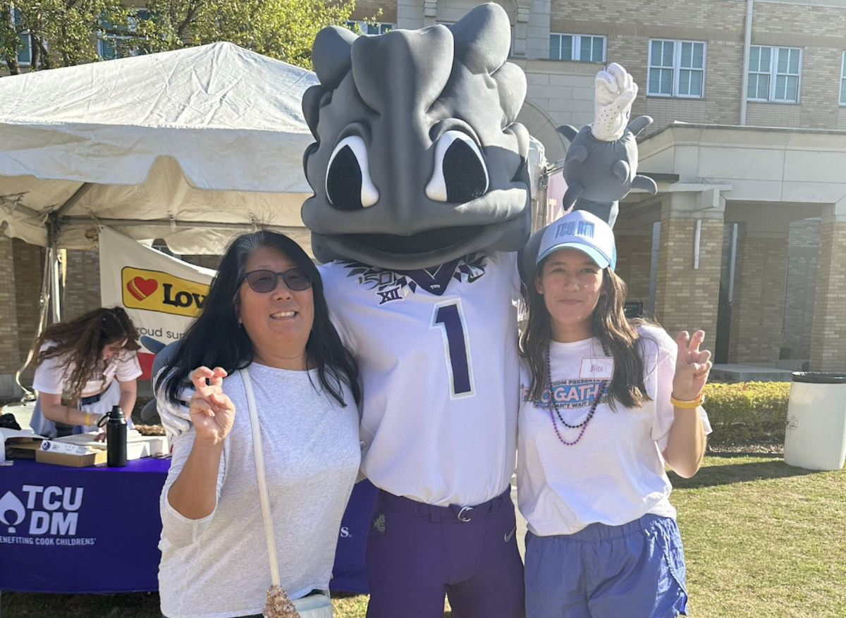 Bri Gervais pictured at Frogathon 2022 with Superfrog in the TCU Commons. (Photo courtesy of Bri Gervais)