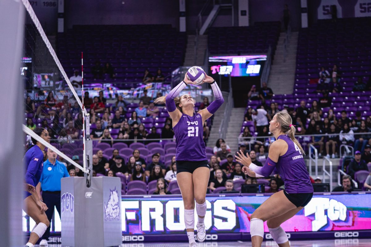 Lily Nicholson sets the ball for TCU, during match up against the University of Kansas Oct. 22, 2023. (Photo courtesy of TCU Athletics)