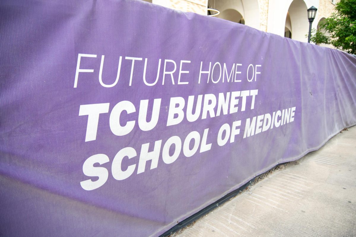 A tarp announcing the new location of the TCU Burnett School of Medicine located in the Fort Worth, Tx downtown medical district. (Lance Sanders / TCU360 Photographer)