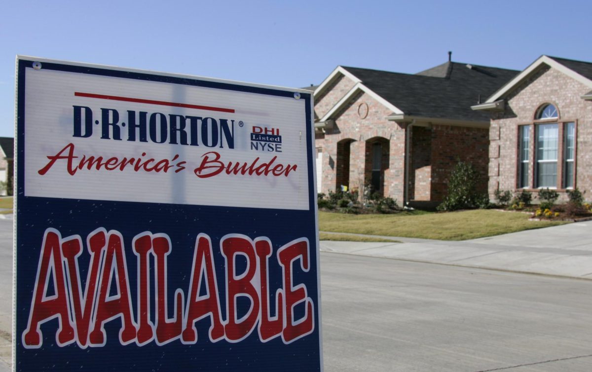 A sign in a subdivision shows newly built D.R. Horton houses for sale in a Fort Worth, Texas file photo from Nov. 14, 2006. D.R. Horton Inc., one of the nations largest homebuilders, said fiscal first-quarter sales orders fell 28 percent year-over-year, dampening sentiment that the housing sector may be getting over its troubles. (AP Photo/Donna McWilliam, File)
