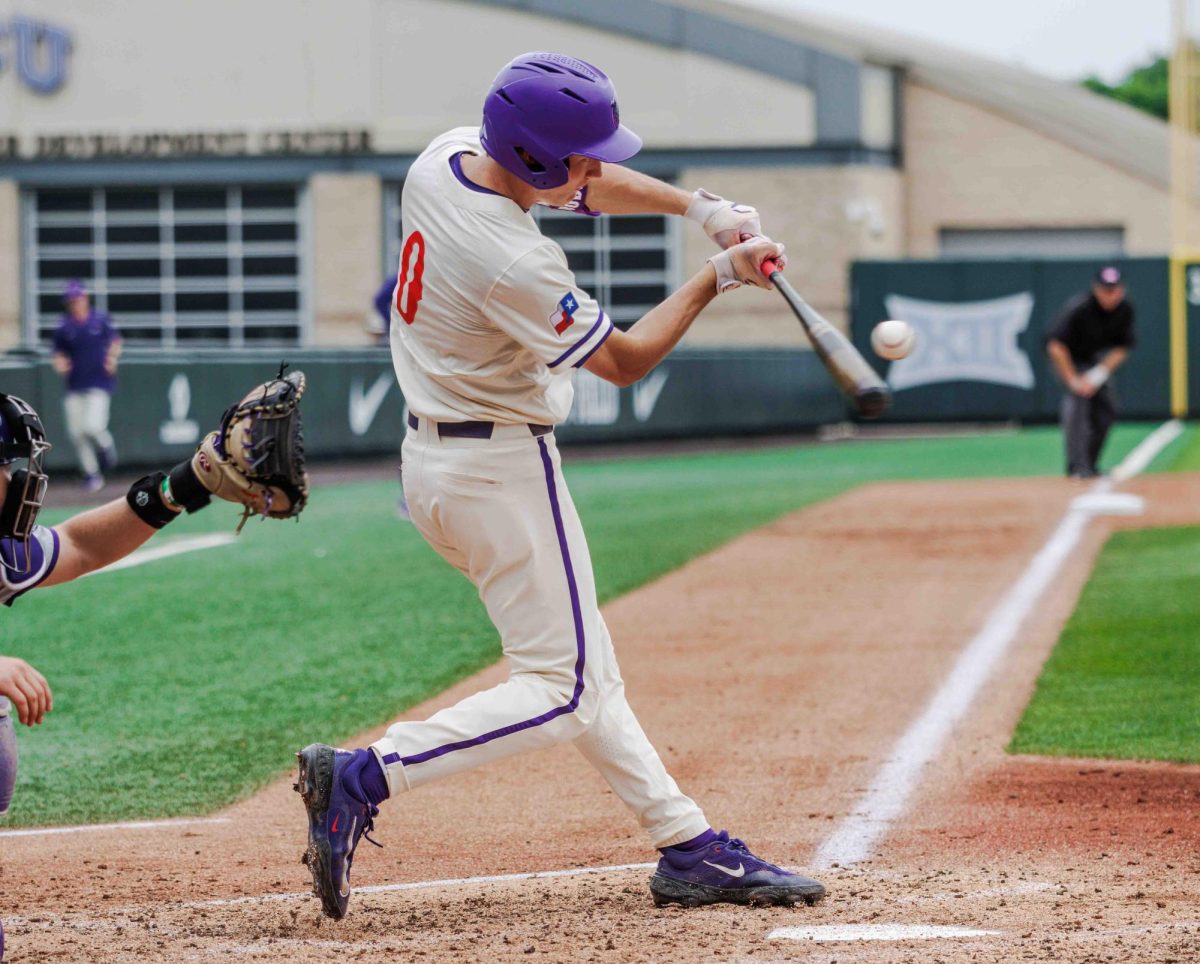 TCU second basemen Ryder Robinson hits the ball for a base hit at Lupton Stadium in Fort Worth, Texas on April 27th, 2024. The TCU Horned Frogs fell to the Kansas State Wildcats 6-3 in game 2 of the doubleheader. (TCU360/Tyler Chan)