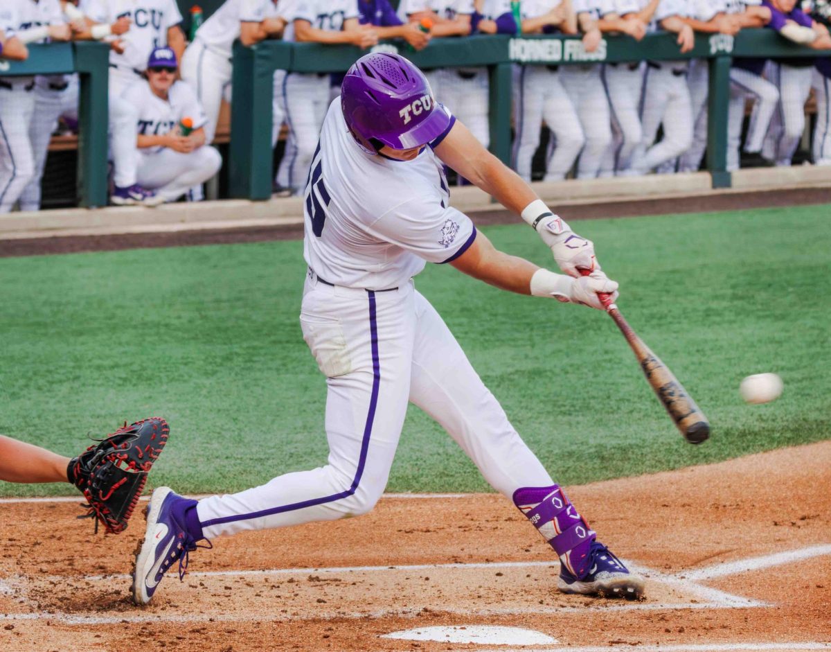 TCU outfielder Chase Brunson hits the ball for a base hit at Lupton Stadium in Fort Worth, Texas on April 12th, 2024. The TCU Horned Frogs fell to the Texas Tech Red Raiders 7-1. (TCU360/  Tyler Chan)