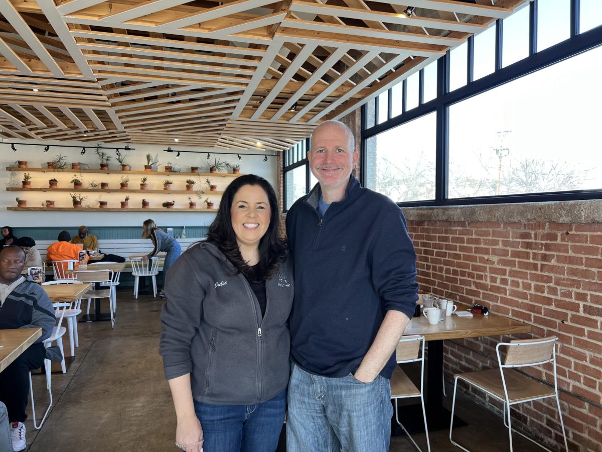 Julie Williams (left) and Jeff Williams (right) smile for a photo while showcasing Taste Community Kitchen.