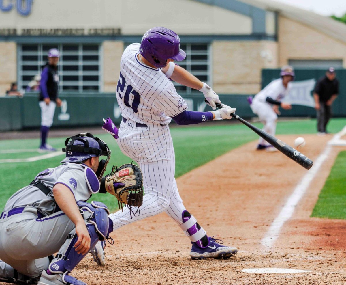 TCU left fielder Jack Arthur hits the ball for a base hit at Lupton Stadium in Fort Worth, Texas on April 27th, 2024. The TCU Horned Frogs beat the Kansas State Wildcats 7-4 in game 1 of the doubleheader. (TCU360/Tyler Chan)