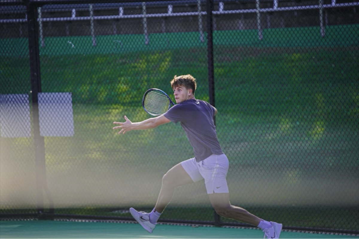 Luke Swan strikes a ball during practice. (Photo courtesy of gofrogs.com)
