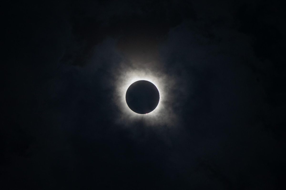 The+moon+covered+the+sun+as+the+eclipse+reached+totality+on+April+8%2C+2024.+%28Garrett+Cook%2FStaff+Photographer%29%0A