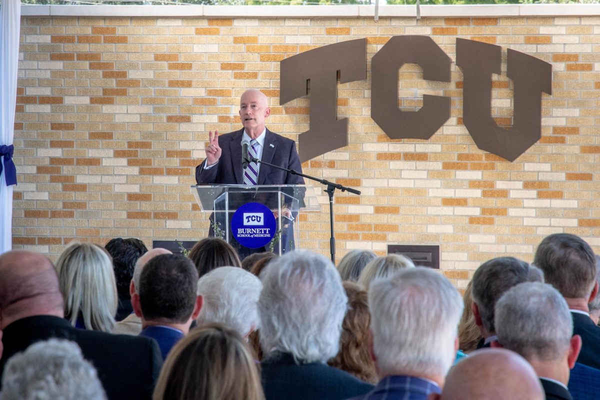 Chancellor Victor Boschini gives a speech during the dedication of Arnold Hall, Sept. 24, 2024. (TCU 360 Photo by Shane Manson)