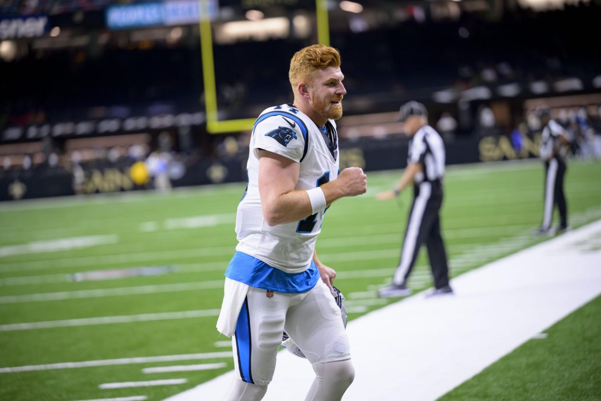 Carolina Panthers quarterback Andy Dalton (14) leaves the field after an NFL football game against the New Orleans Saints in New Orleans, Sunday, Sept. 8, 2024. (AP Photo/Matthew Hinton)