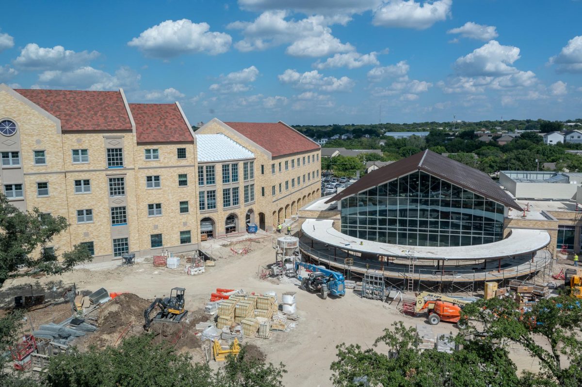 Workers build the new dormitories across from the Neeley School of Business Sept. 17, 2024. (Photo by TCU 360 Staff)