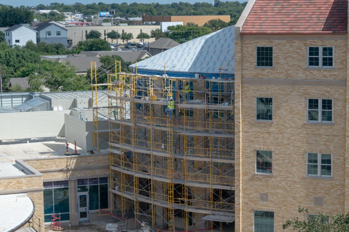 Workers build the new dormitories across from the Neeley School of Business Sept. 17, 2024. 