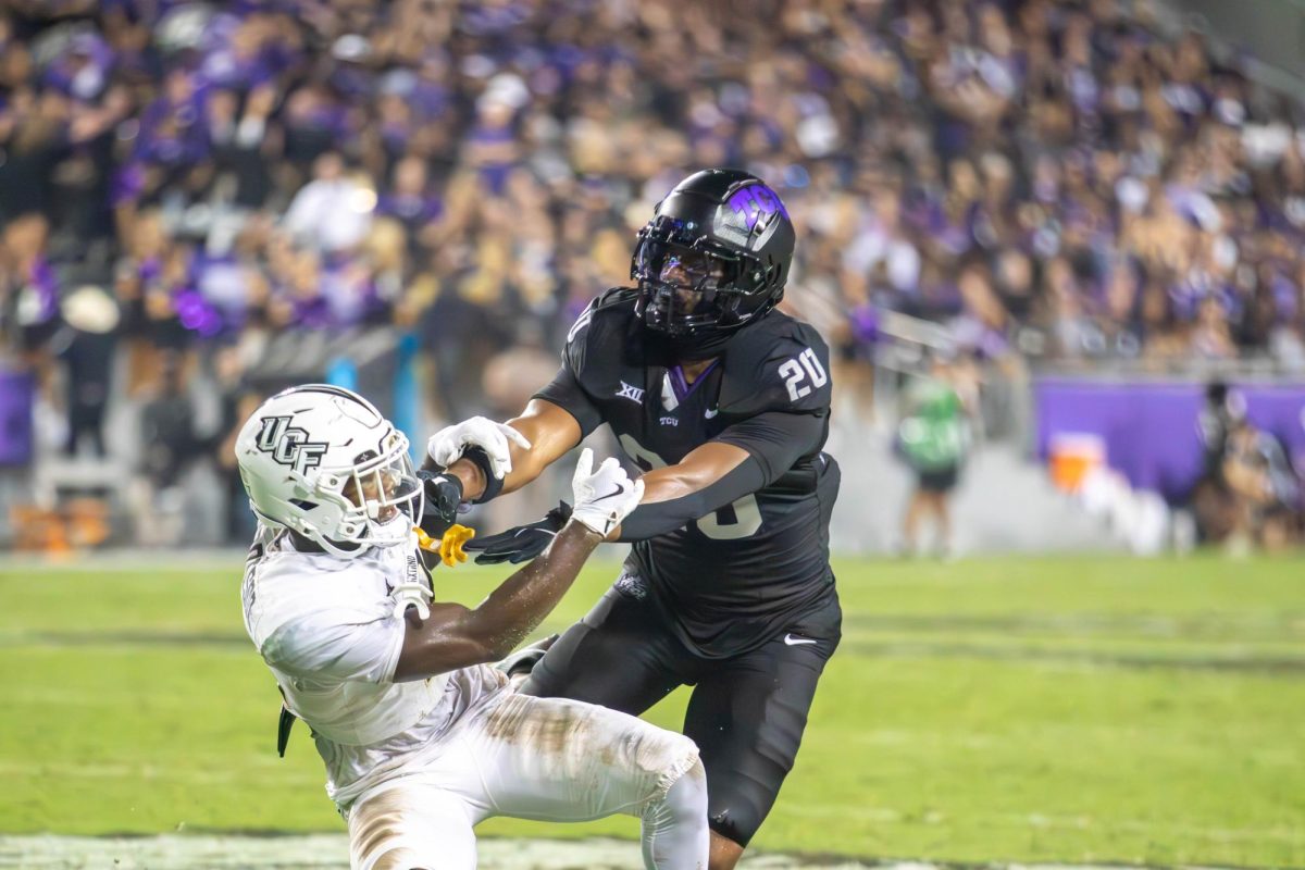 Dominique Johnson blocking a defender from UCF.