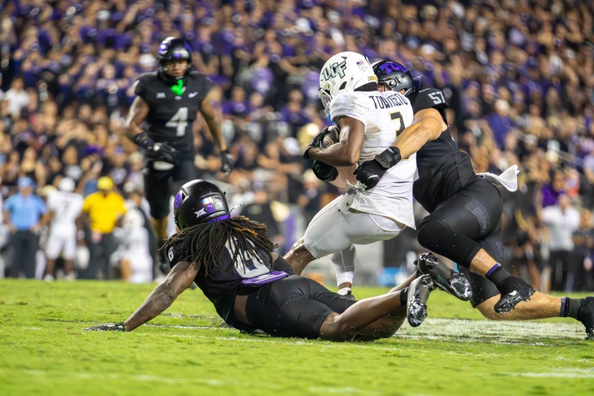 Johnny Hodges tackling the running back from UCF.