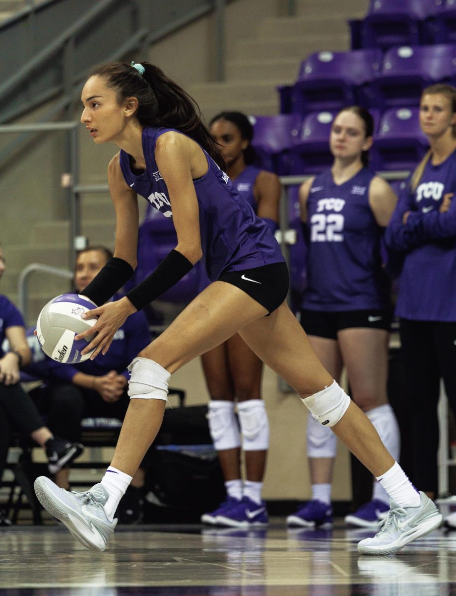 TCU Volleyball's Melanie Parra runs up to serve the ball at Schollmaier Arena in Fort Worth, Texas on September 20th, 2024. The TCU Horned Frogs swept the Denver Pioneers 3-0. 