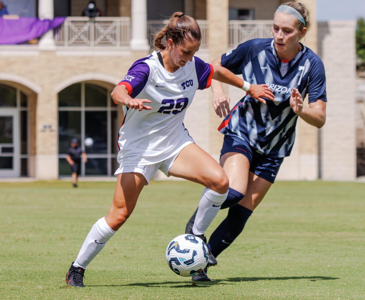 TCU midfielder Abigail Cox battles with a defender at Garvey-Rosenthal Stadium in Fort Worth, Texas on September 22nd, 2024.  The TCU Horned Frogs beat the Arizona Wildcats 1-0. (TCU360/Tyler Chan)